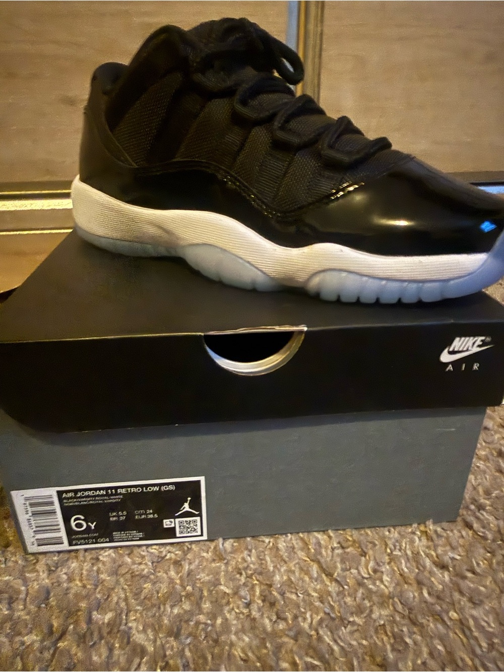 Jordan Kids Black and White Retro Low Sneakers